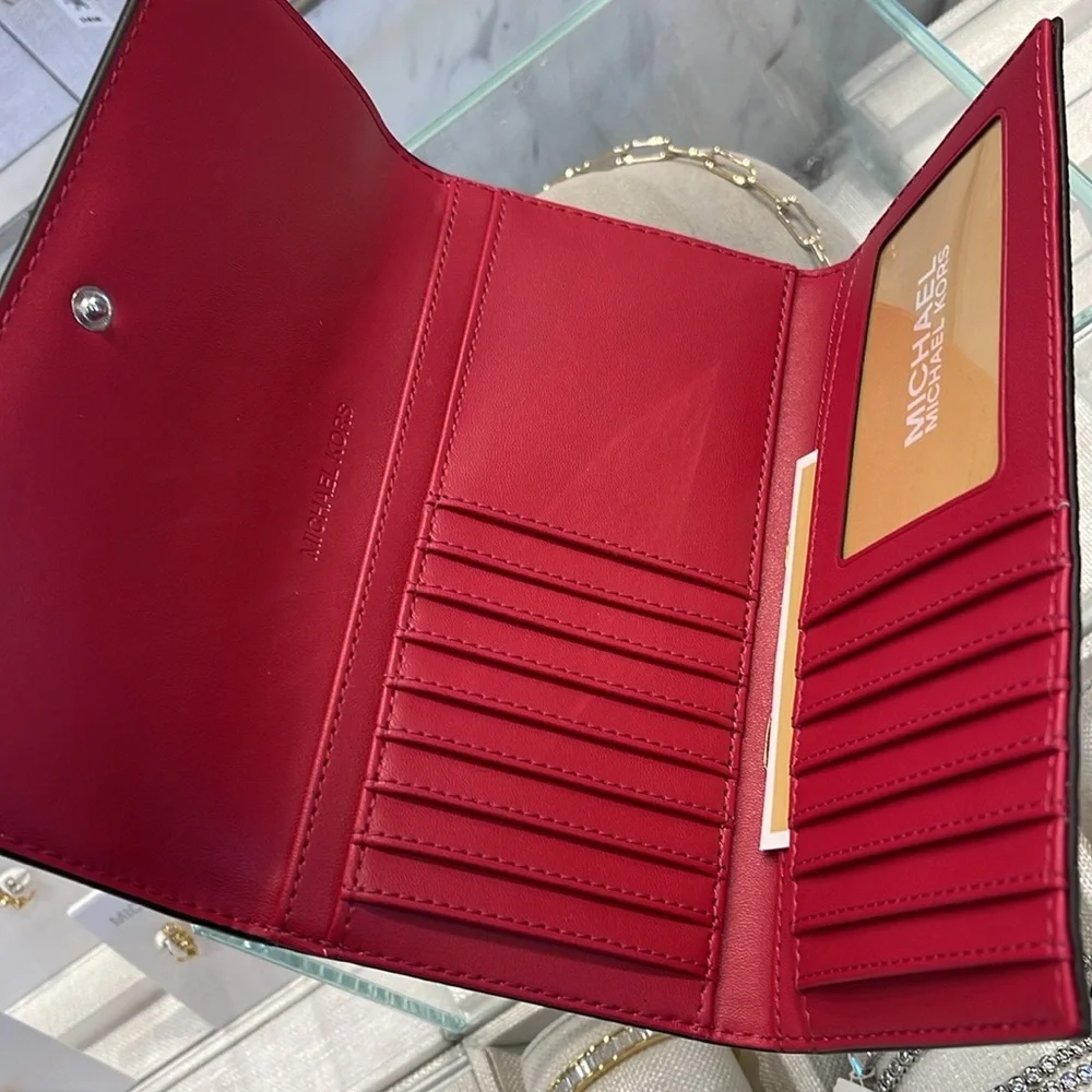 MICHAEL KORS Jet Set Travel Signature Logo Tri-Fold Wallet
DARK RASPBERRY MULTI - Picture 12 of 16